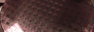 Cropped photograph of a wafer used to produce semiconductors in electronics