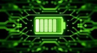 a macro photograph of next generation batteries, green on black background