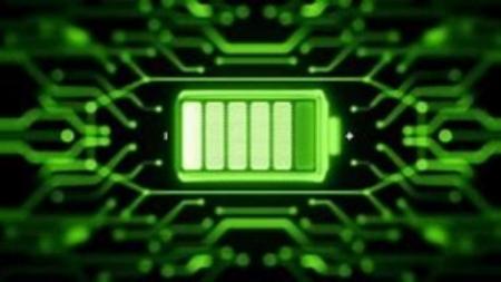 a macro photograph of next generation batteries, green on black background